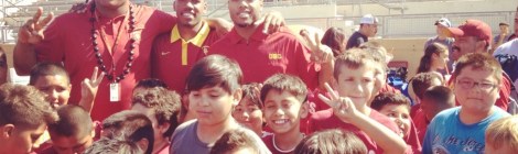 USC Football players (Left to Right - Zach Banner, Jabari Ruffin, and TJ McDonald) visit a youth football camp at Downey high school. (Photo from TJ Mcdonald)